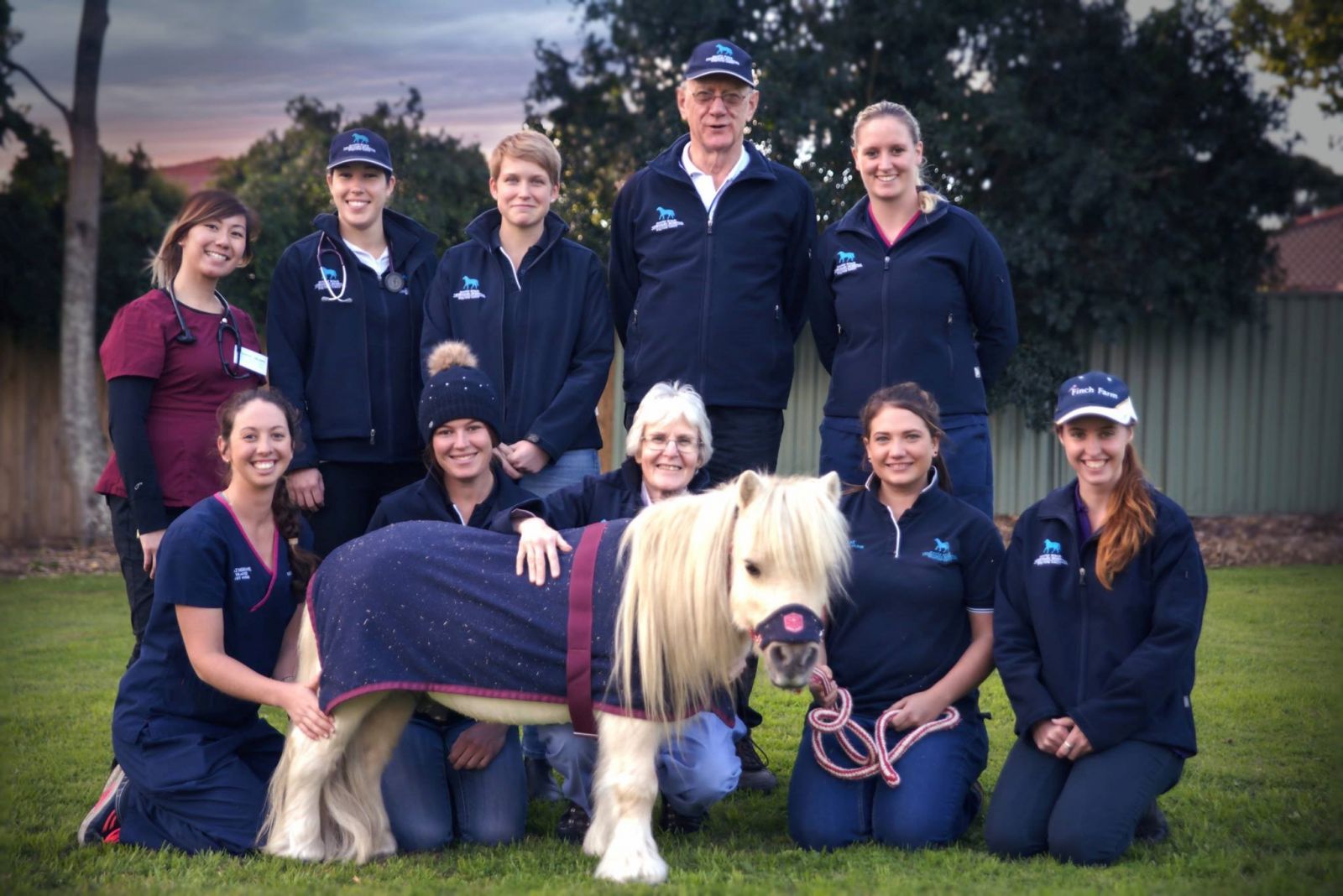 Photo of staff at Manly Road Veterinary Hospital with pony named Snickers.