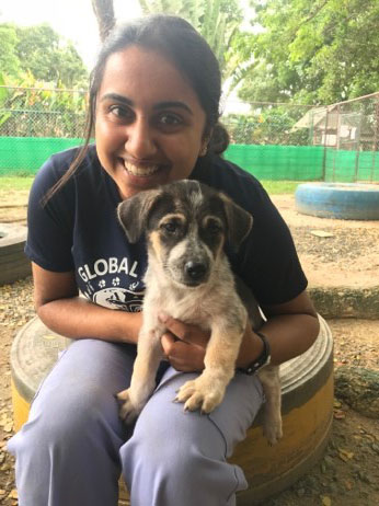 Student veterinarian Malika volunteers with Global Vets